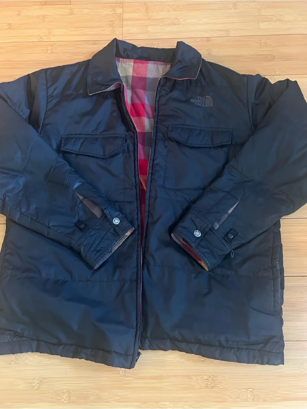The North Face reversible padded jacket black and buffalo plaid flannel Large
